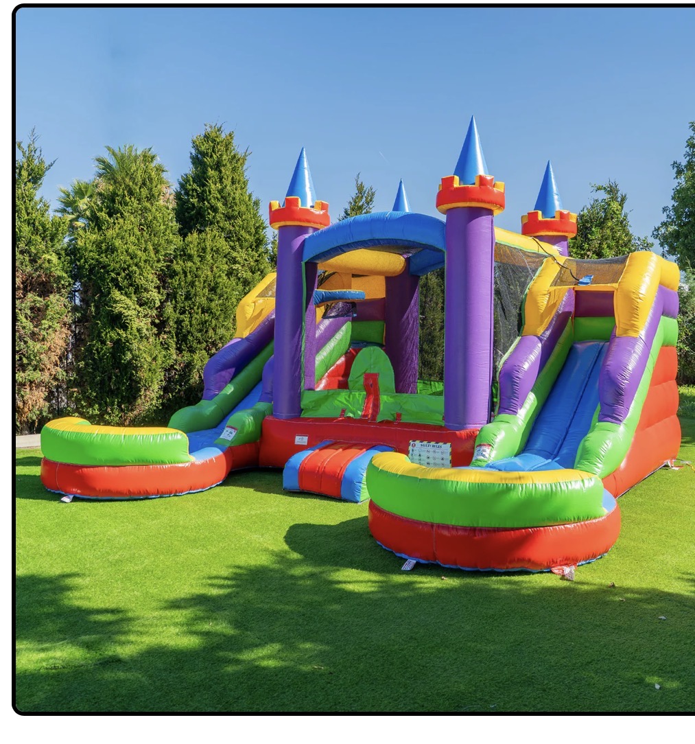 Colorful rainbow castle bounce house combo with dual slides